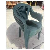 4 green plastic stacking patio chairs