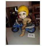 Porcelain man on motorcycle figure