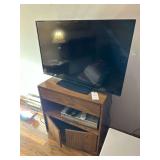 Flat Screen TV, VHS, Cabinet