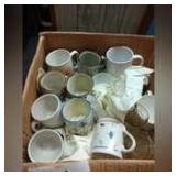 Lot of mugs and cups.