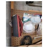 345.items on left side of peg Board wire Brushes porter Cable wrenches eye Guards