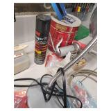 Kitchen sink, snake table, lamp, wires for picture frames, pitch remover, and plastic clamps