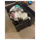 A Plastic Tote 32x18x19 Inches with Plumbing Supplies