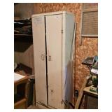 2 DOOR METAL CABINET-NO CONTENTS SELLS WITH IT