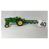 ERTL 1/16TH JOHN DEERE 3020 W/ 4 BOTTOM PLOW