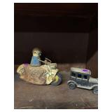 2 Toys, cast iron T-Model and Tin Motorcycle Push Toy