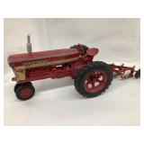 Ertl IH Farmall 560 Toy Tractor w/ IH McCormick 3