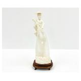 Finely Carved Ivory Fisherman on Wood Base