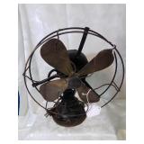 Antique wagner table fan runs and oscillates