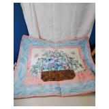 Beautiful quilted wall hanging with flowers and