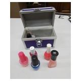 Purple travel box with new fingernail polish