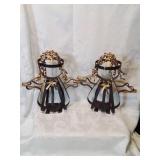 Pair of metal angel candle holders