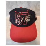 Red and black number fifty seven racing cap