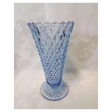 Blue glass vase eight inches tall