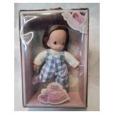 New precious moments buddy doll