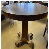 Round Table with Curved Feet