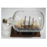 1988 "MAGGIE BROWN" SHIP IN A BOTTLE ON A STAND