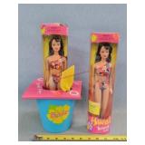 2- Hawaiian Barbie Dolls & Sand Bucket