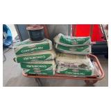 8 - 60 LB. BAGS OF CONCRETE ON DRYWALL CART