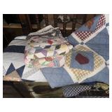 Two nice machine sewn quilts and old tattered