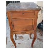 Faux marble top Tobacco cabinet?