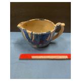 Pottery mixing bowl with pouring spout