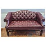 TUFFTED LEATHER UPHOLSTERED LOVE SEAT