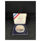 1991 USO SILVER DOLLAR IN PRESENTATION CASE