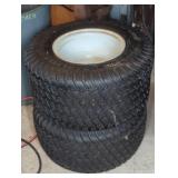 (2) CARLISLE RIDING MOWER TIRES ON RIMS