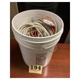 Bucket of extension cords