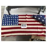 Old embroidered 48 star flag and a 50 star flag