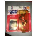 2 basketball and 1 baseball collectables