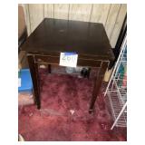 Small wooden table with turnable top