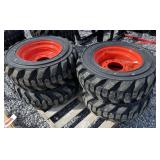 (4) 10-16.5 N.H.S Skid Loader Tires W/ Rims