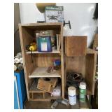 Wooden shelf full of parts