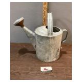 Galvanized watering can