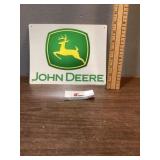 Metal John Deere advertising sign