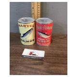 Salmon and herring cans unopened but empty