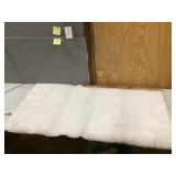 Furry rug approximately 30 x 60