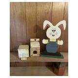 Birdhouses and rabbit decor