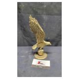 Brass eagle landing statue