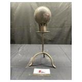 Vintage marble ball on metal pedestal