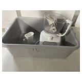 Kitchen aid food processor in bus bin