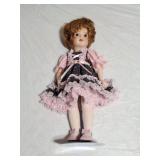 PORCELAIN DOLL ON STAND