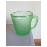 green glass measure cup