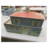 old tin doll house w/some furniture