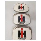 3 I.H. belt buckles