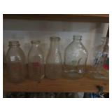 5 milk bottles