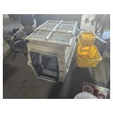 Dog crates and mop bucket