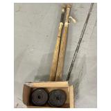 Wooden baseball bats and weights